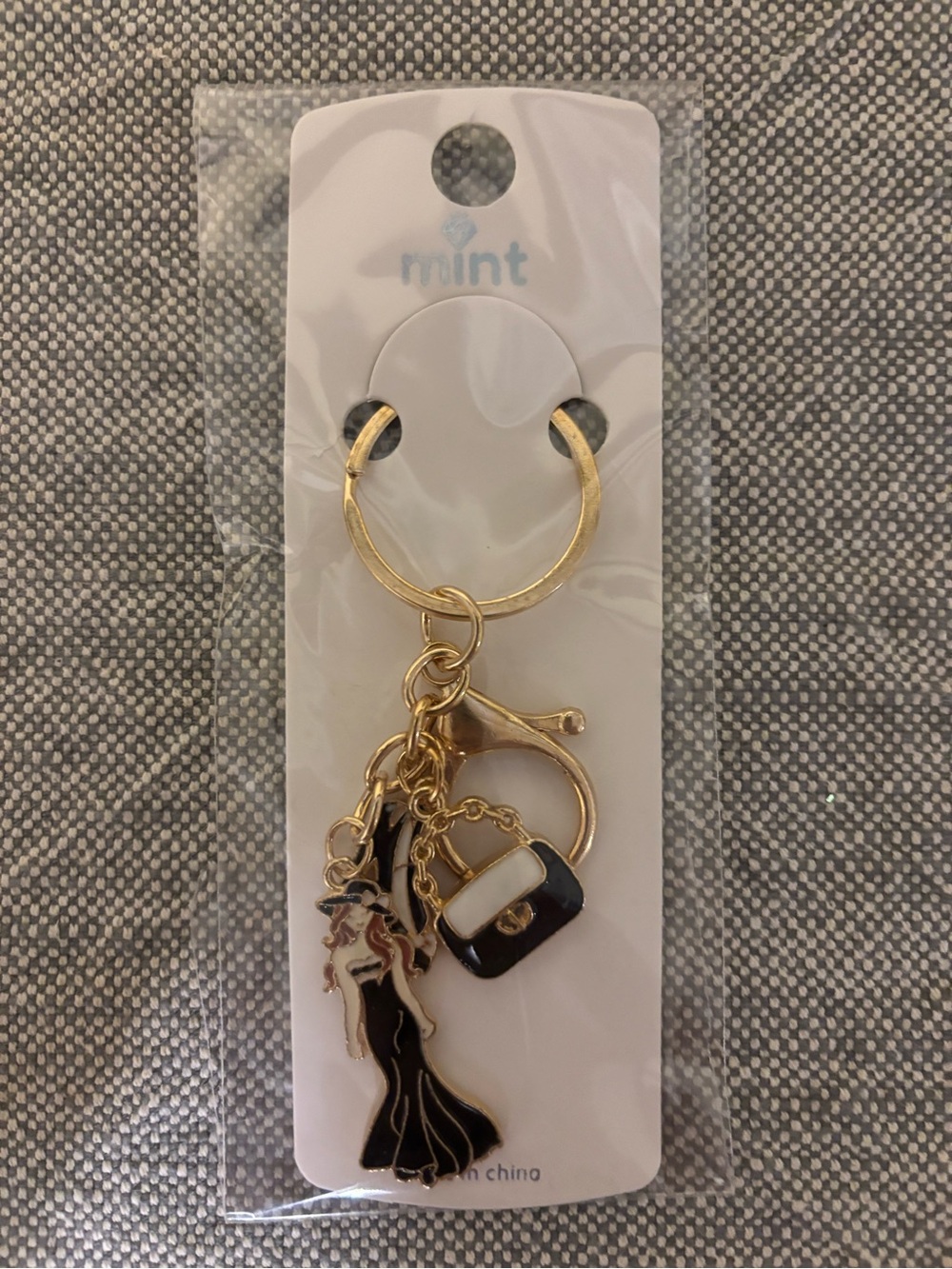 Gold-tone Black and White Charm Keychain